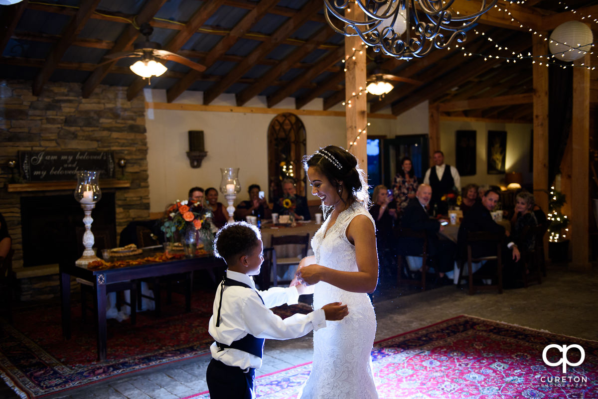Bride dancing with her son at the reception.