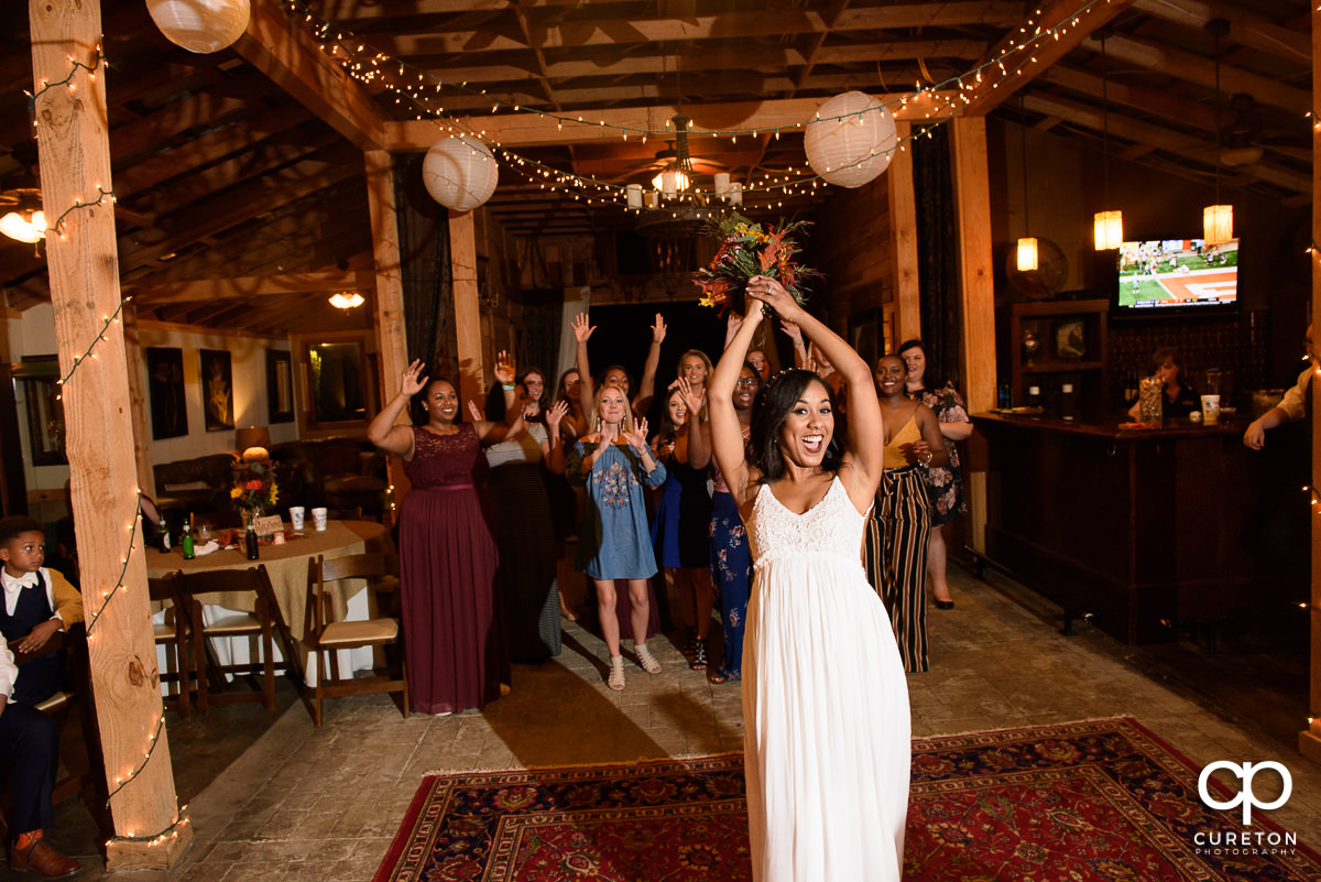 Bride tossing the bouquet.