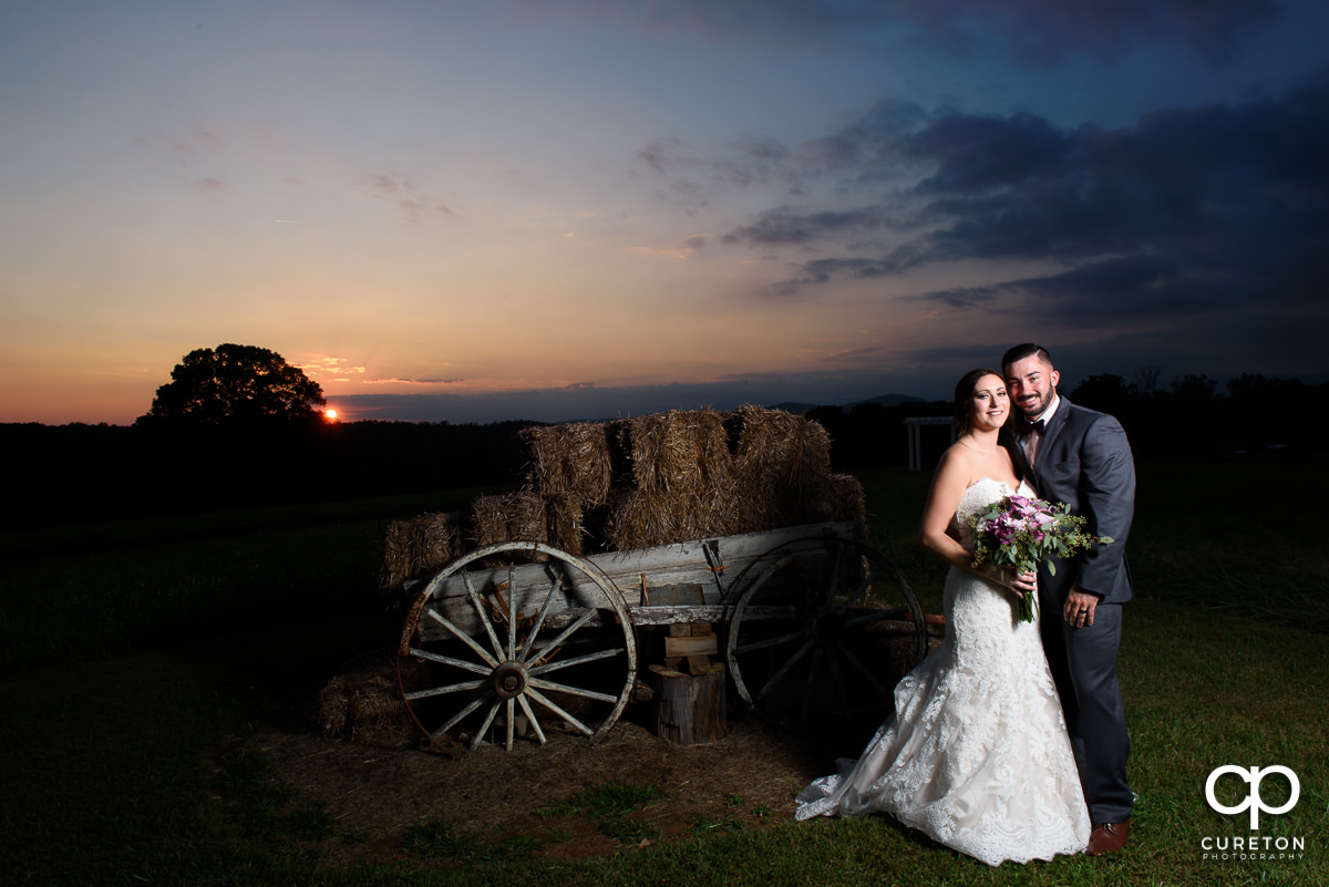 Bride and groom at sunset after their wedding at Lindsey Plantation.