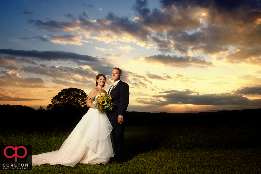 Bride and groom at sunset after their Lindsey Plantation wedding in Taylors,SC.
