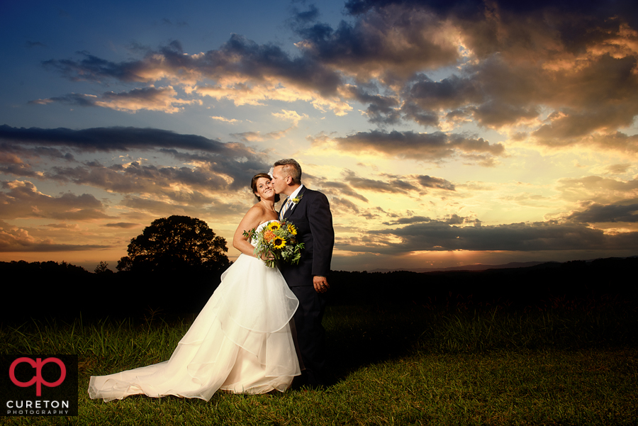 Bride and Groom at sunset at Lindsey Plantation.