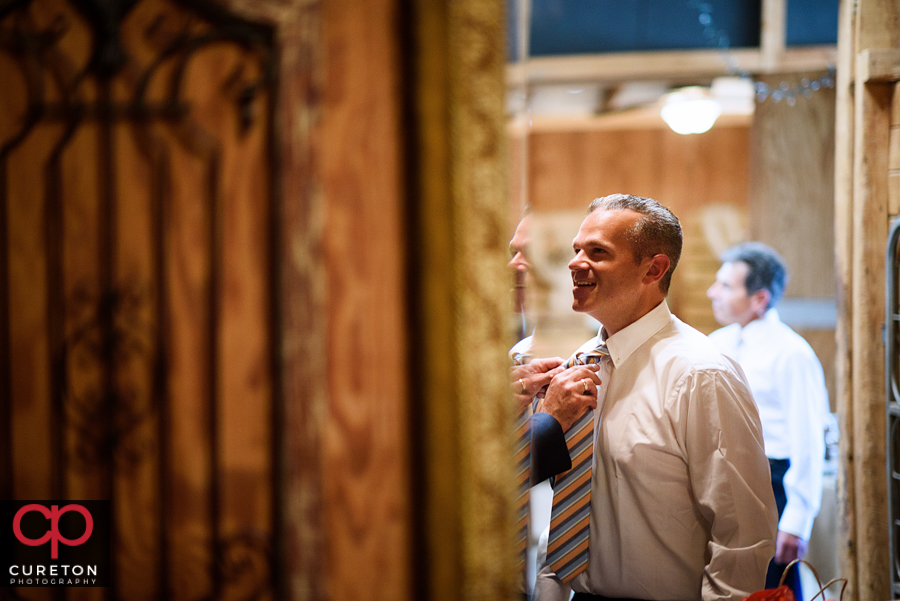 Groom getting ready.