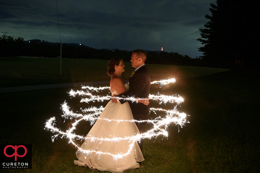 Epic sparkler shot of bride and groom during Lindsey Plantation wedding reception.