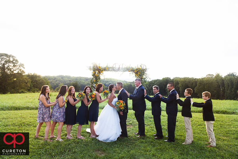 Wedding party in the field at Lindsey Planation.