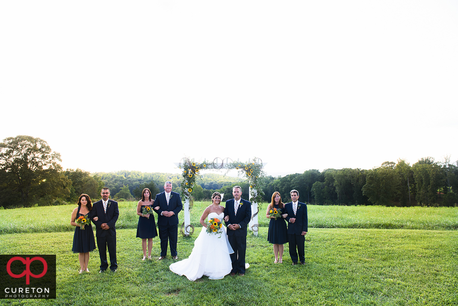 Wedding party in the field at Lindsey Planation.