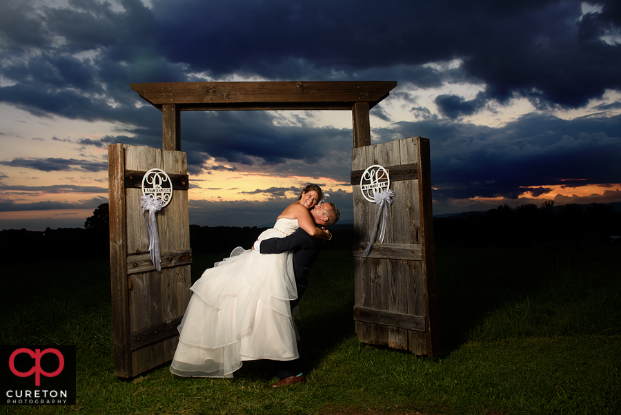 Bride and groom sunset photo at Lindsey Plantation.