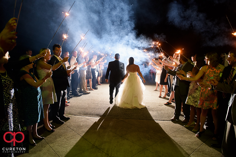 Epic rustic wedding sparkler leave near Greenville,SC.