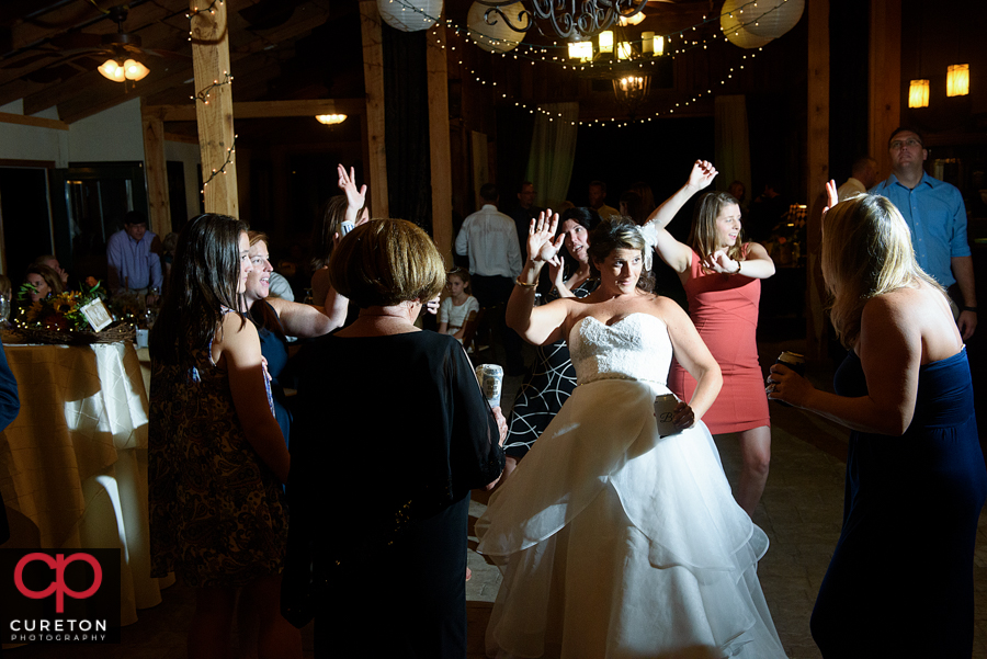 Wedding guests dancing.