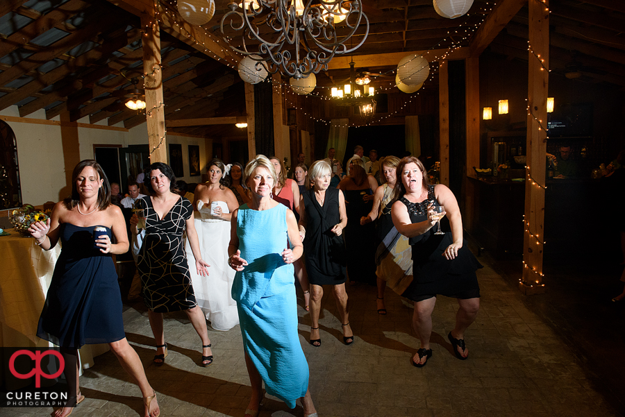 Wedding guests dancing.