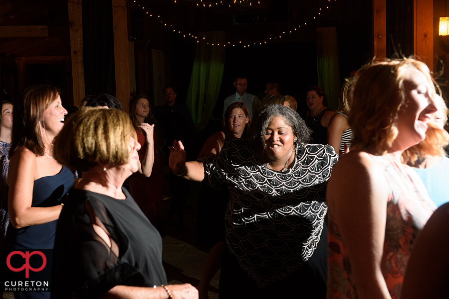 Wedding guests dancing.