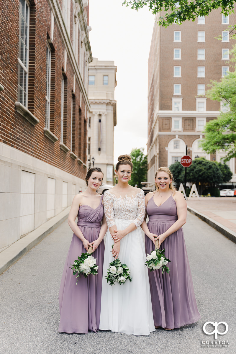 Bride hanging out with her bridesmaids.