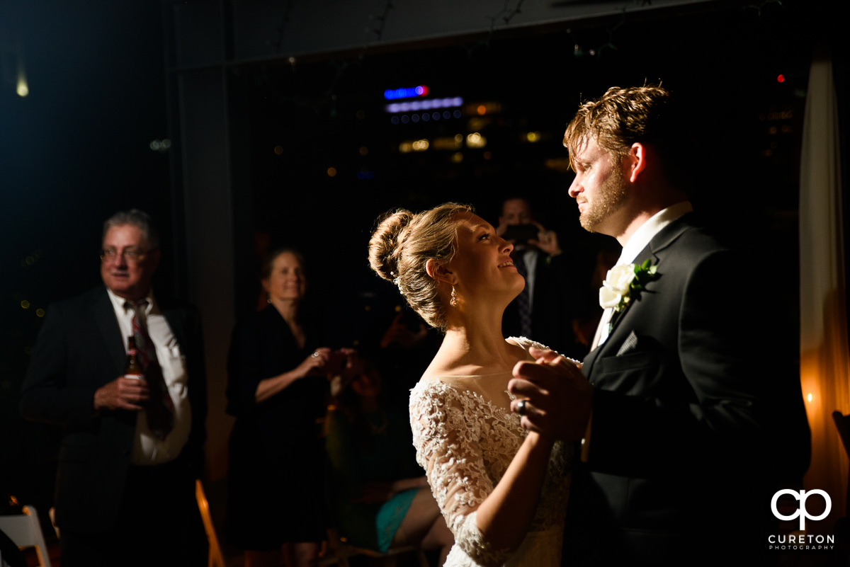 Bride and groom first dance at their Loft at Soby's wedding reception in downtown Greenville,SC.