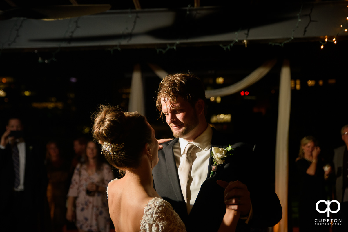 Groom gazing at his bride during their first dance at their Loft at Soby's wedding reception in downtown Greenville,SC.