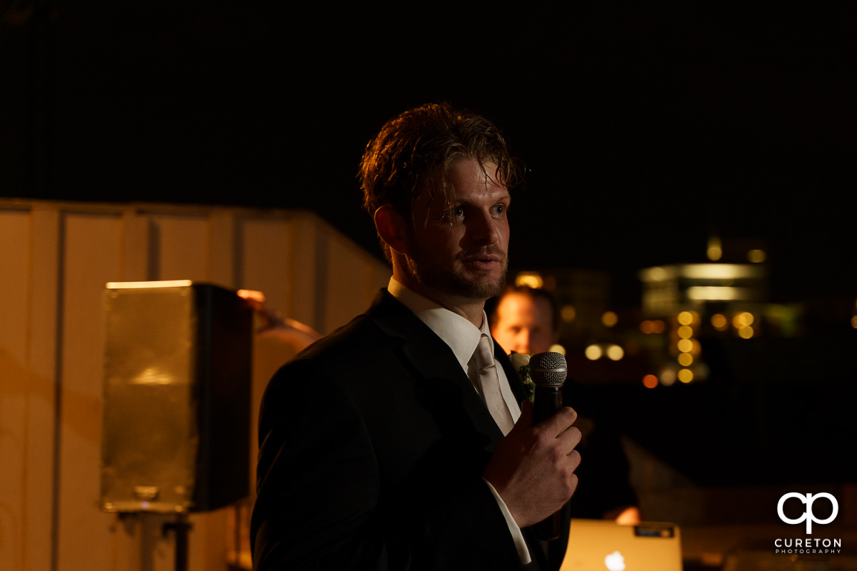 Groom giving a speech.