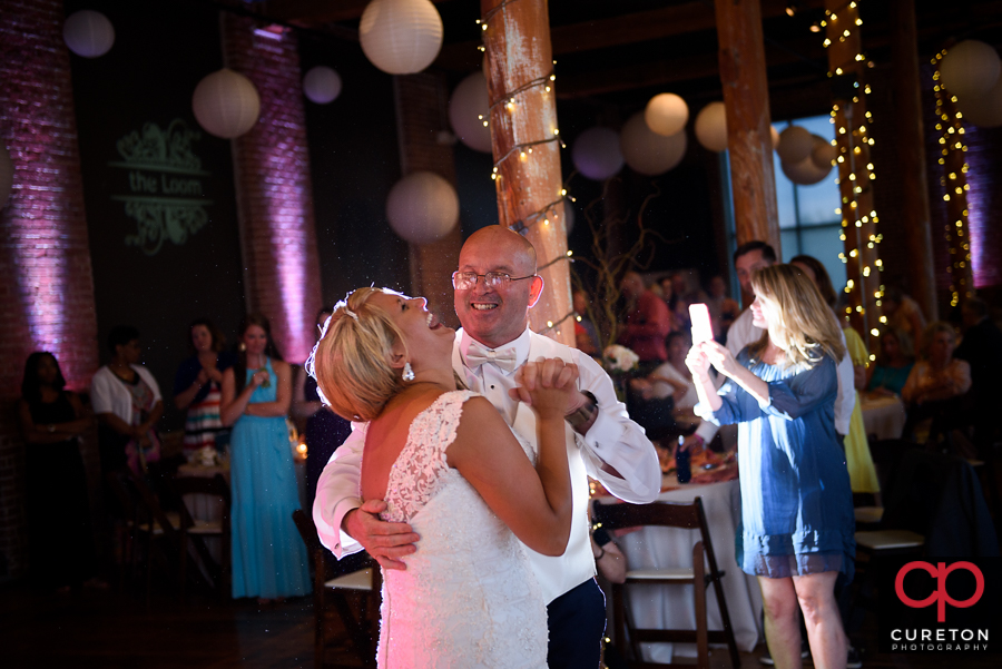 Bride dancing with her dad.