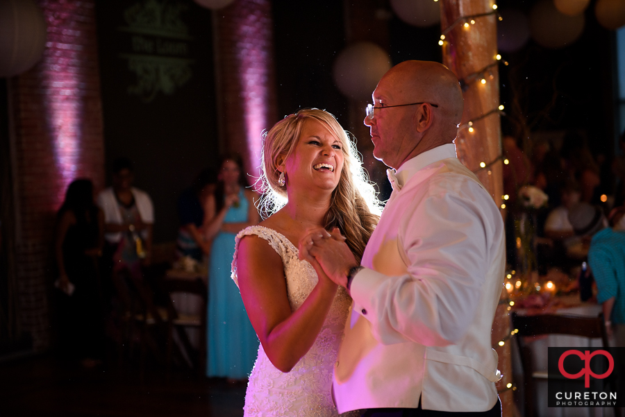 Bride dancing with her dad.