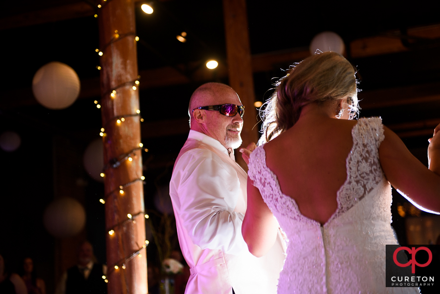 Bride dancing with her father in law.