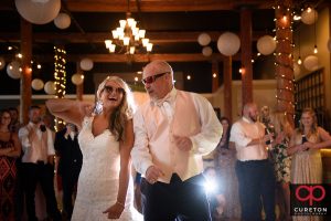 Bride dancing with her father in law.