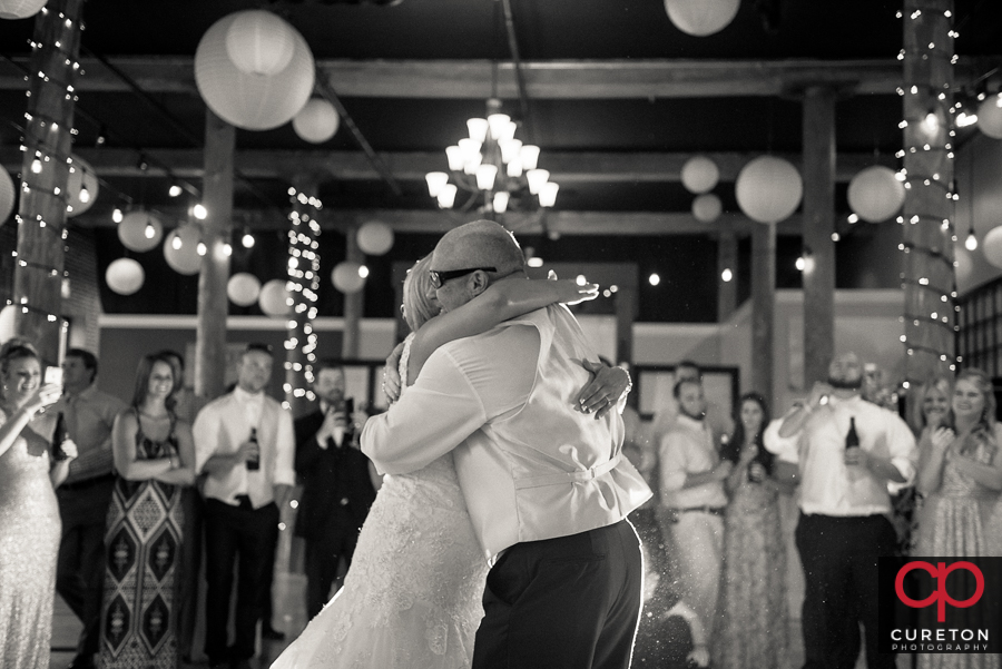 Bride dancing with her father in law.