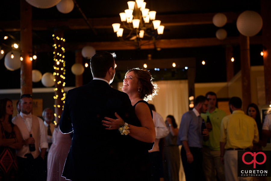 Groom dancing with his mom.