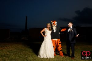 Bride and Groom outside the Loom with the Clemson Tiger.