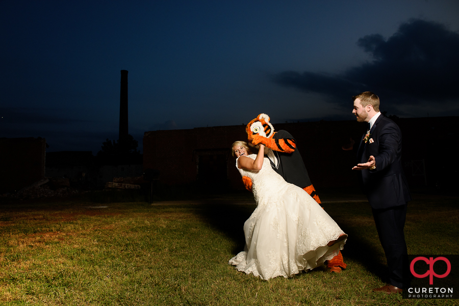 Clemson Tiger dancing with the bride at her wedding.