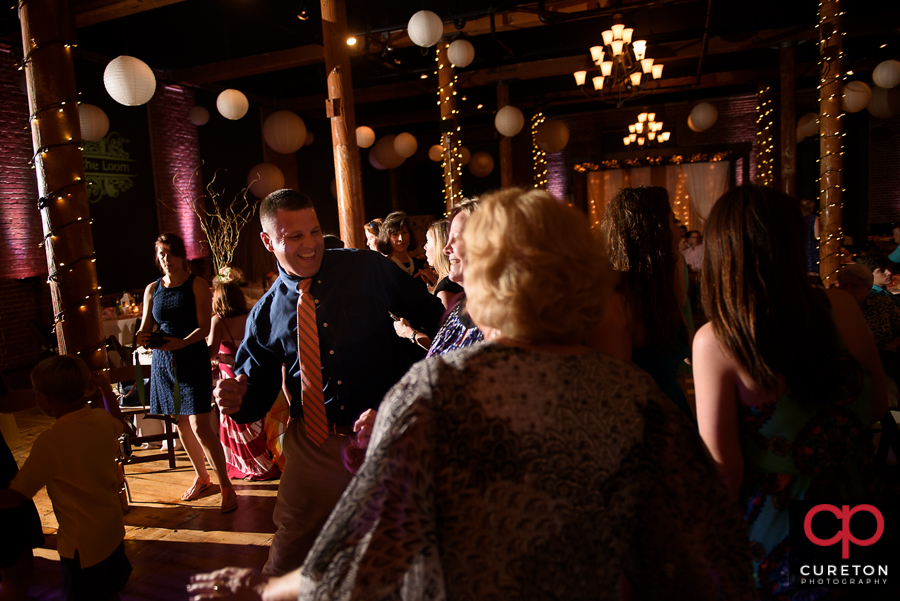 Wedding guests dancing to the sounds of Greenville wedding dj Uptown Entertainment.