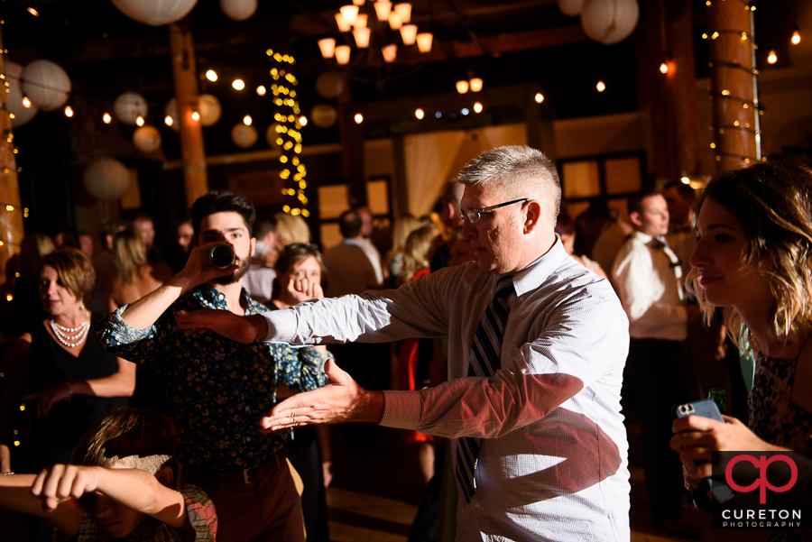 Wedding guests dancing to the sounds of Greenville wedding dj Uptown Entertainment.