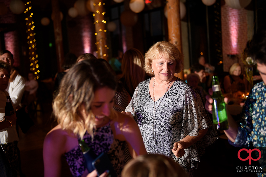 Wedding guests dancing to the sounds of Greenville wedding dj Uptown Entertainment.