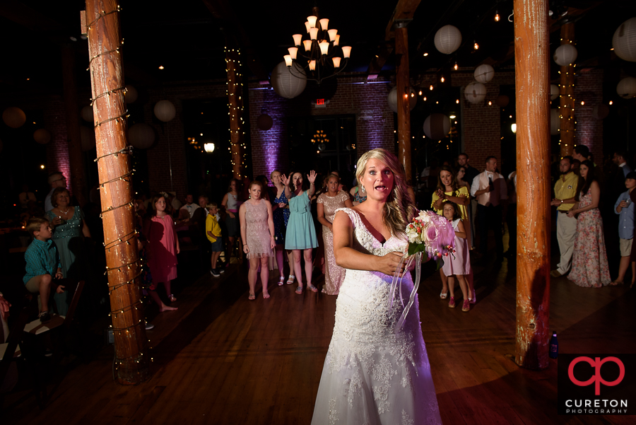 Bride tossing the bouquet.