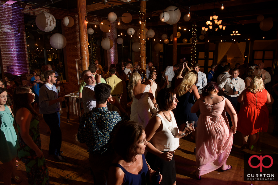 Wedding guests dancing to the sounds of Greenville wedding dj Uptown Entertainment.