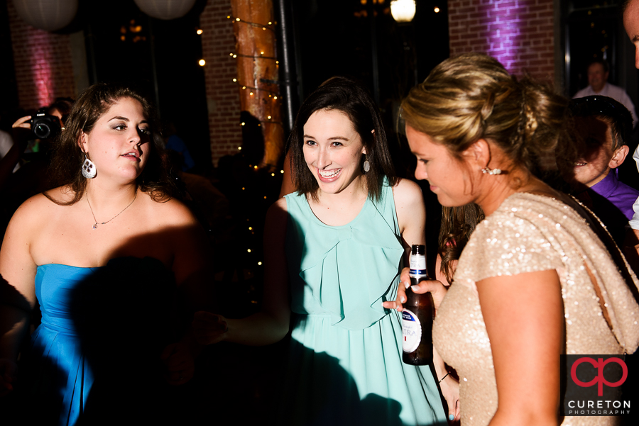 Wedding guests dancing to the sounds of Greenville wedding dj Uptown Entertainment.