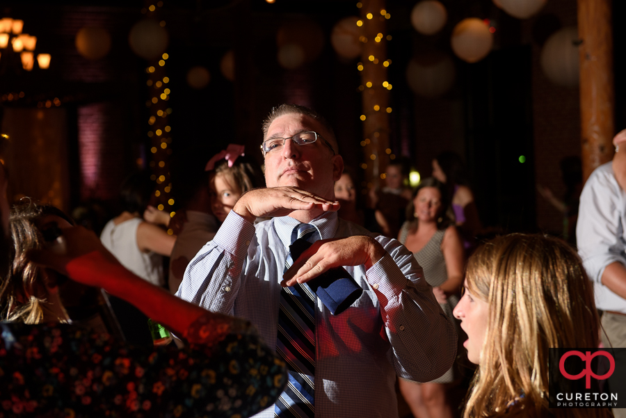 Wedding guests dancing to the sounds of Greenville wedding dj Uptown Entertainment.