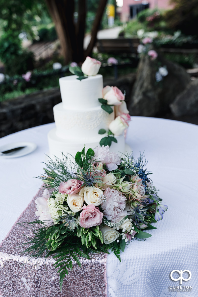 Wedding cake and flowers.