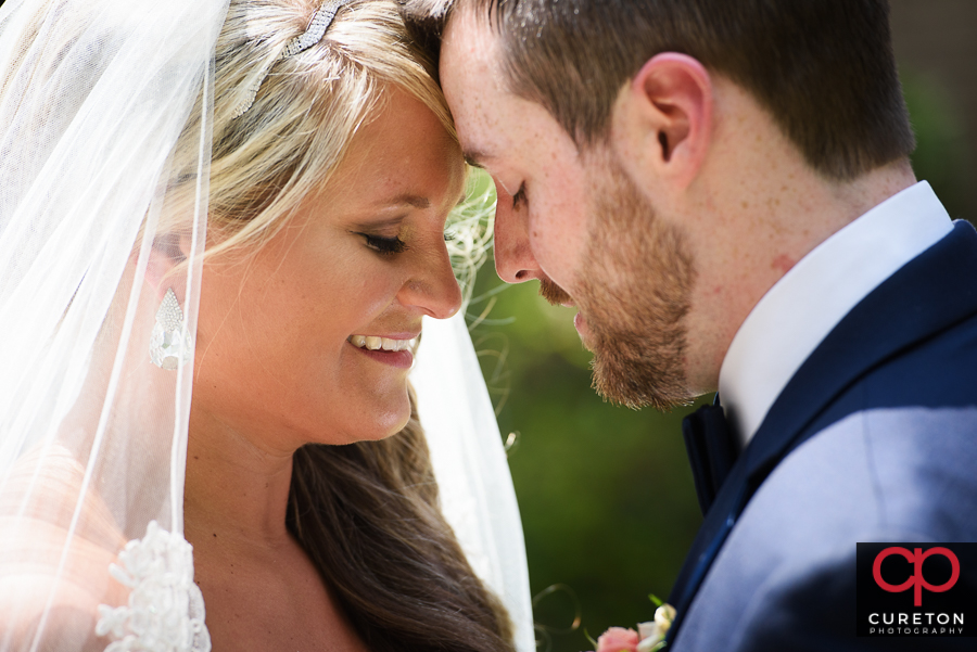 Bride and Groom during their first look before their wedding at Mitchell Road Presbyterian Church.