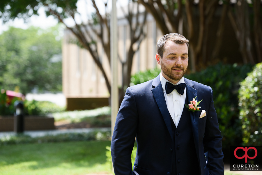 Groom waiting for the first look.