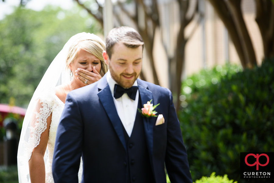 Bride gets emotional before their first look in Greenville.