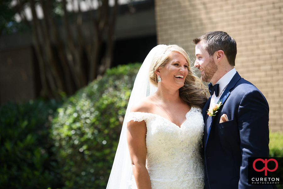 Bride and Groom first look at Mitchell Road Presbyterian Church.