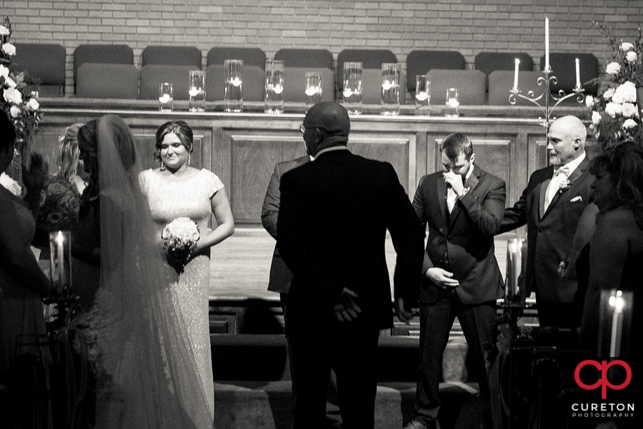 Groom breaks down as he sees his bride.