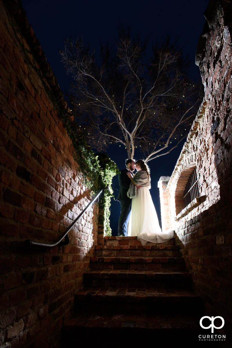 Bride and groom at twilight after their wedding at The Old Cigar Warehouse on New Years Eve.