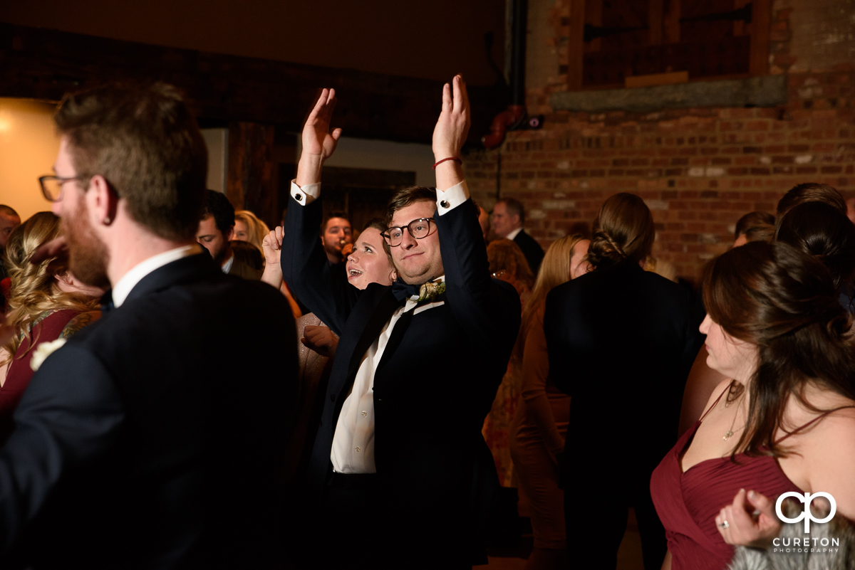 Wedding guest dancing.