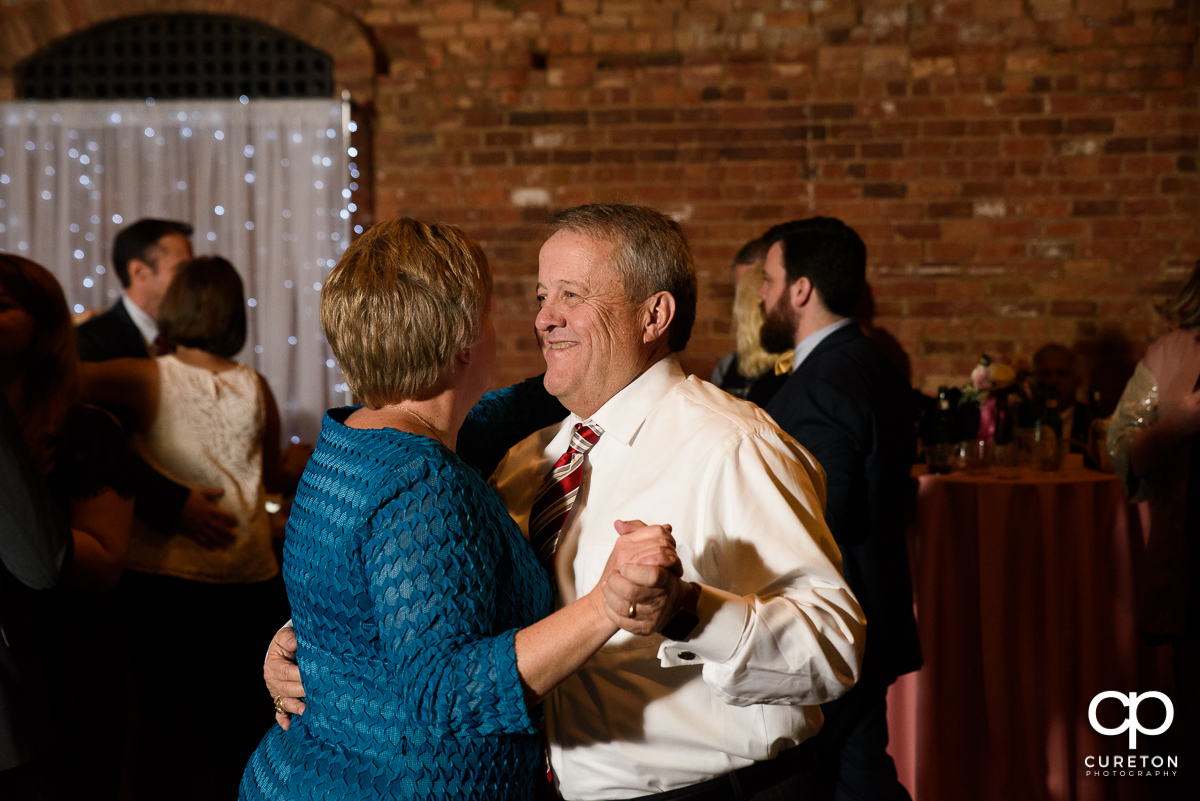 Wedding guest dancing at The Old Cigar Warehouse.