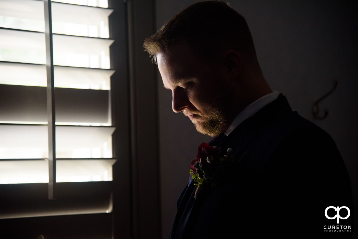 Groom getting ready for his wedding ceremony.