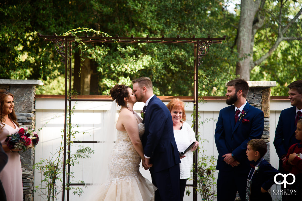 First Kiss at the wedding ceremony.