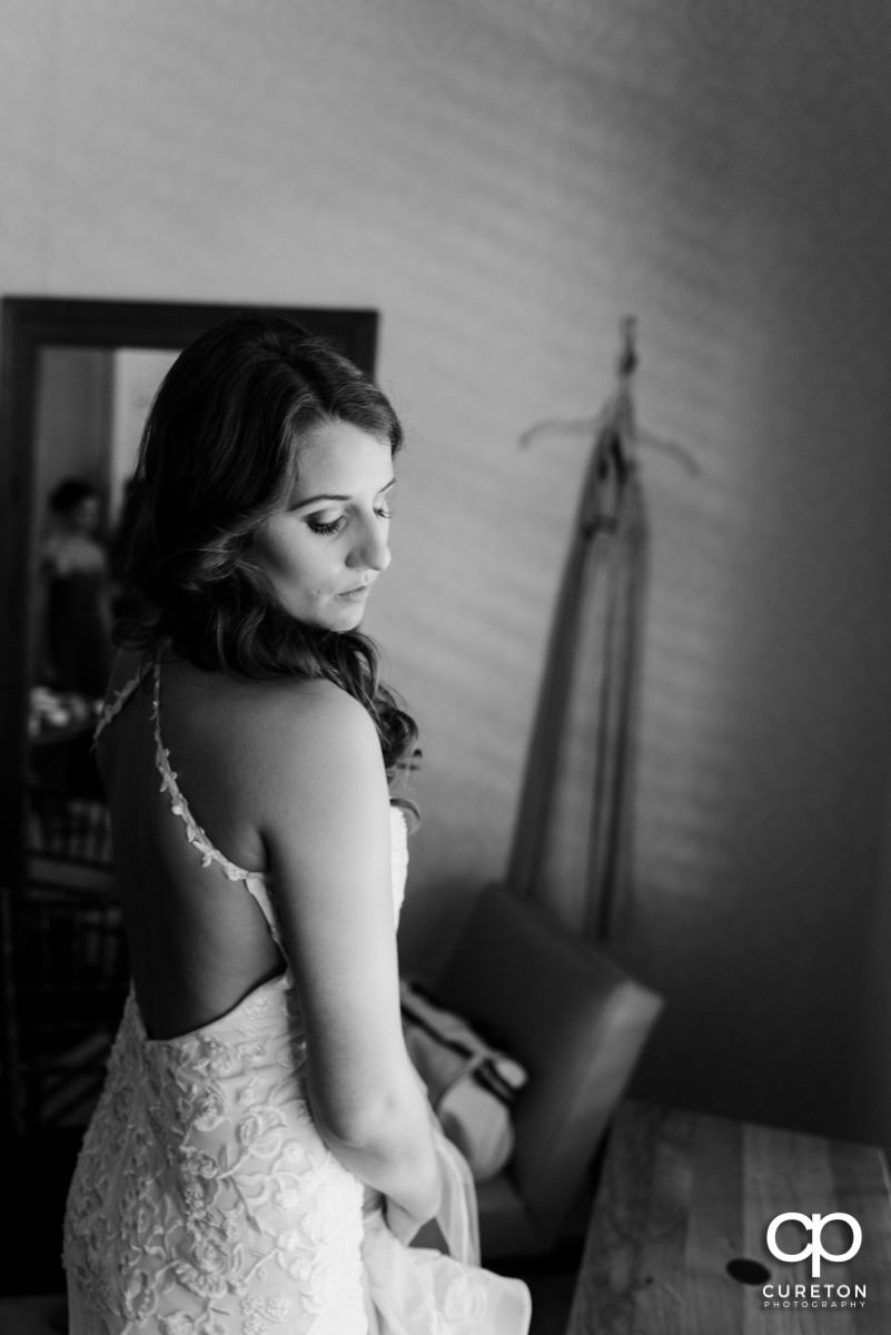 Bride getting ready in the bridal suite.