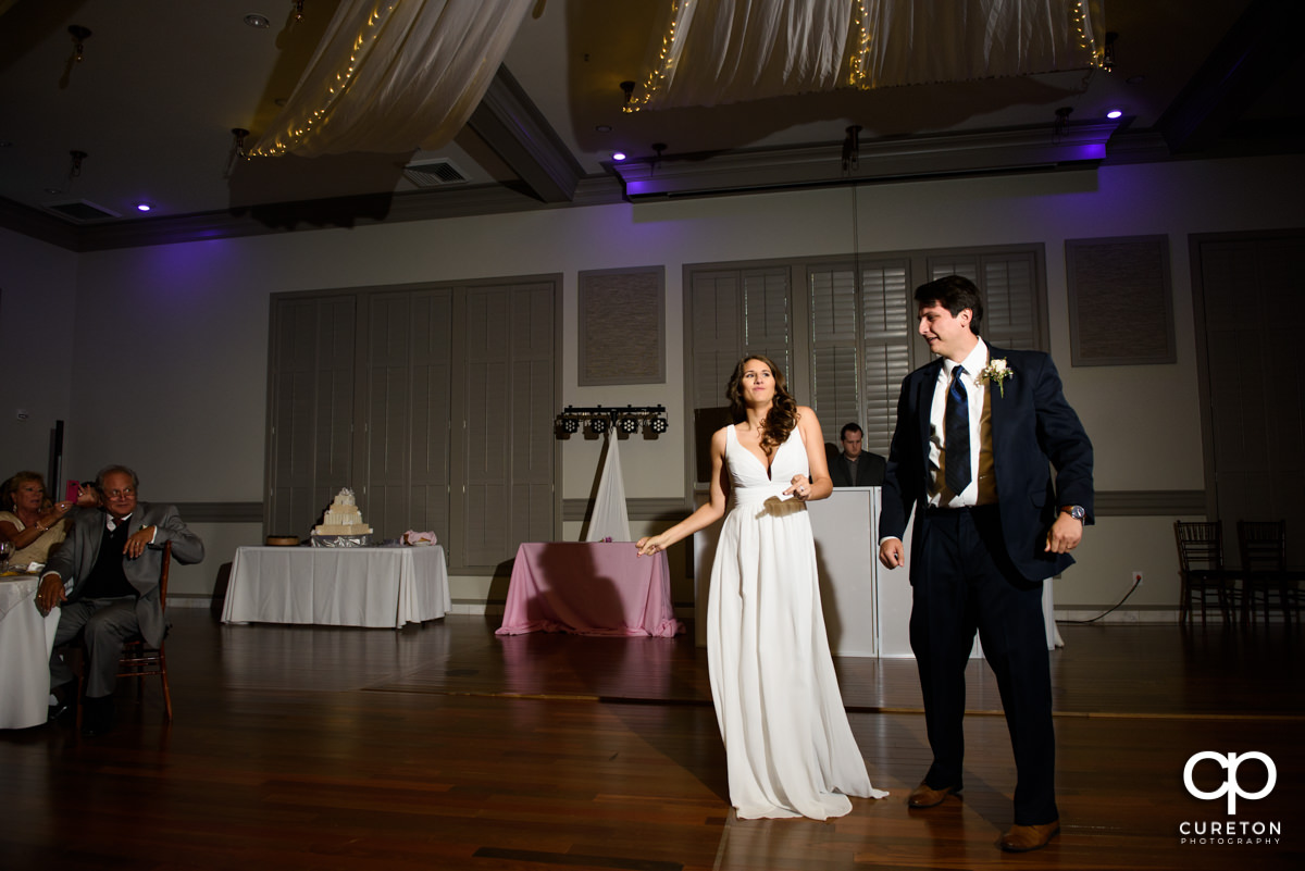 Bride and groom change up their first dance.
