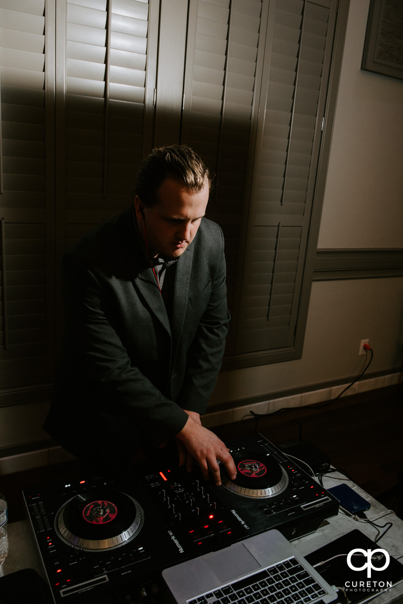DJ Sam from Premiere Party Event Group playing some music at the reception.