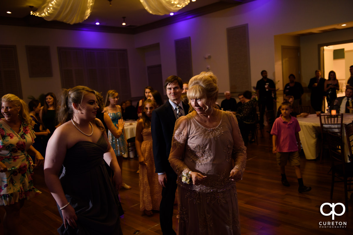 Wedding guests dancing at the reception at Noah's Event Venue in Greenville,SC.