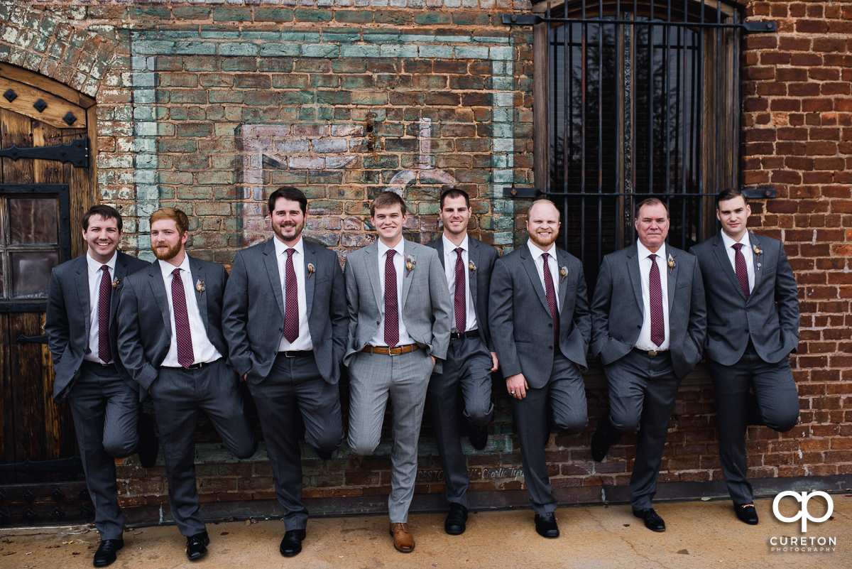 Groom and groomsmen having fun.