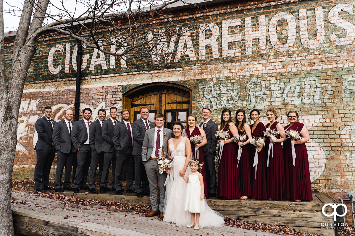 Wedding party hangin out on the back deck of The Old Cigar Warehouse after the wedding.